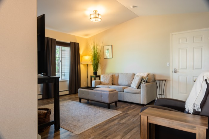 Living room of a Colorado residential listing, bright and staged