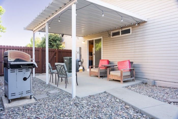 Covered back patio of a Colorado residential listing